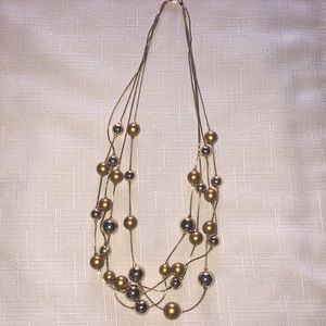 Beautiful 4 strand gold necklace